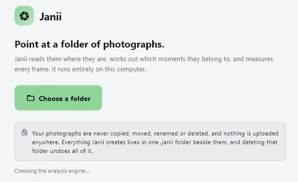 Janii's first screen: 'Point at a folder of photographs', a Choose a folder button, and a note that photographs are never copied, moved, renamed or deleted