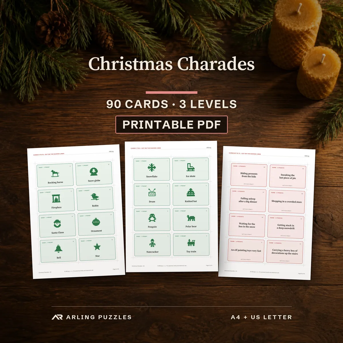 Christmas Charades, 90 cards in 3 levels, printable PDF. Real pages from the file on a table with pine branches: easy picture cards, medium cards and hard cards.